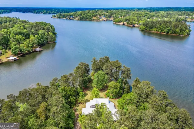 a living room with fireplace furniture and a flat screen tv