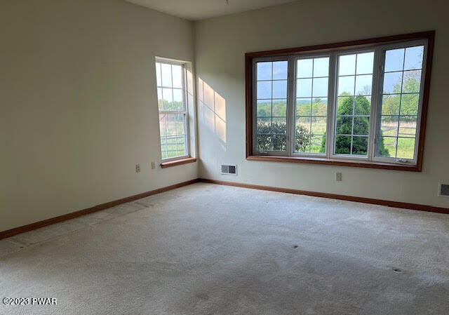 382 Roemerville Road Newfoundland, PA 18445 - Photo 10 of 25 an empty room with a window