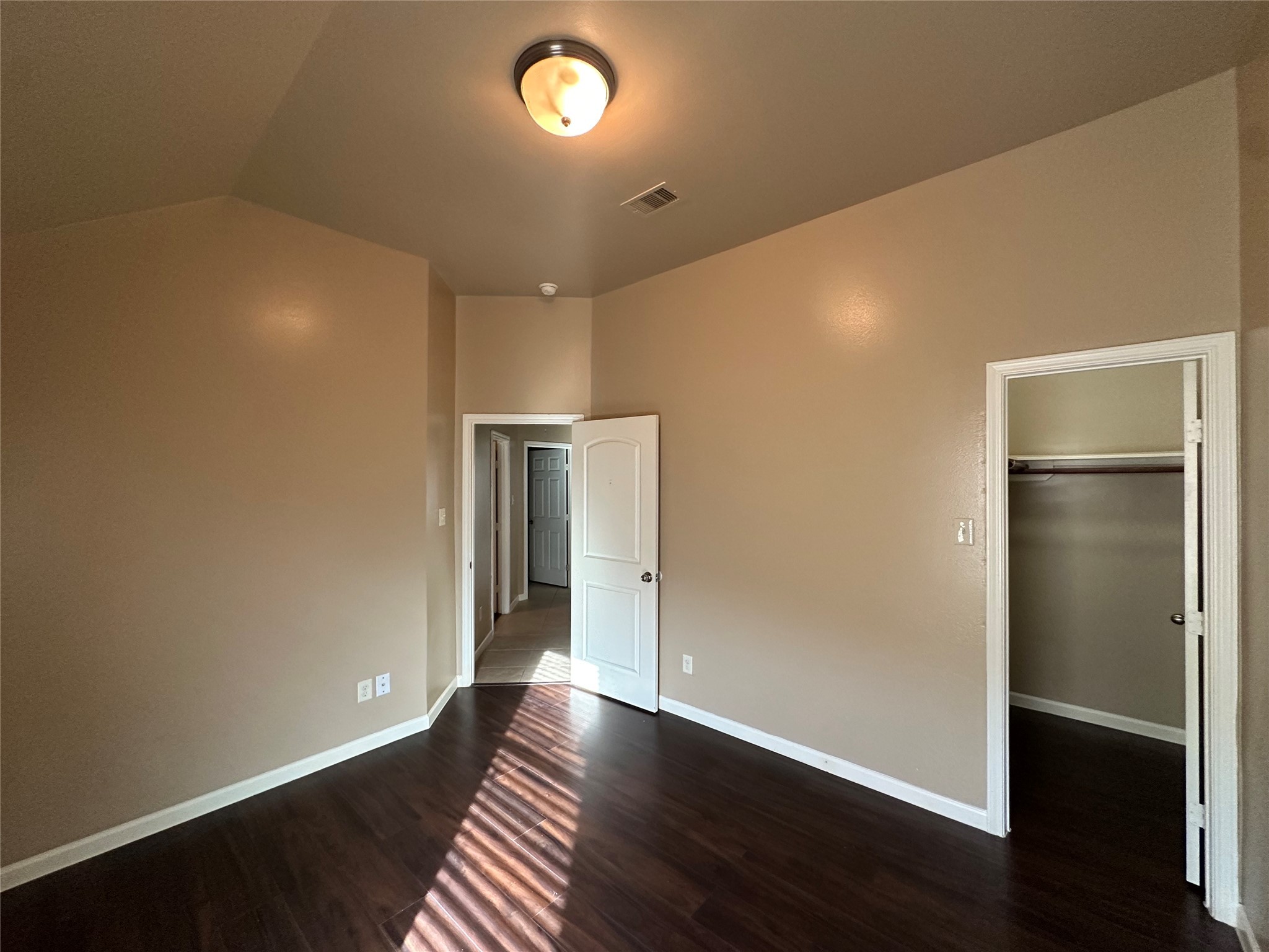 27511 Gatlin Lane Spring, TX 77386 - Photo 13 of 16 an empty room with wooden floor and closet