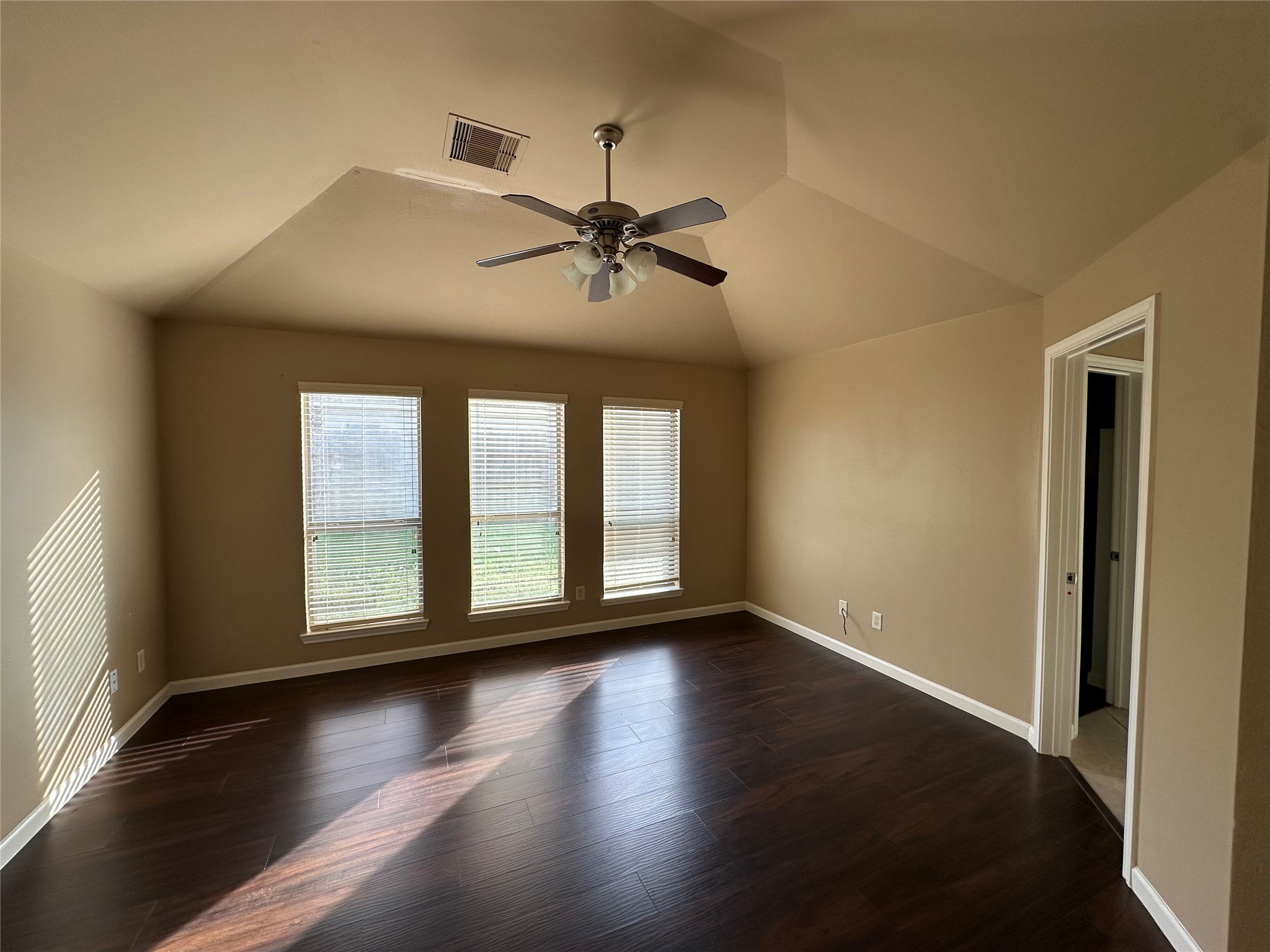 27511 Gatlin Lane Spring, TX 77386 - Photo 9 of 16 a view of empty room with wooden floor and fan