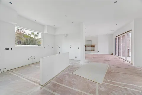 a big room with windows and closet