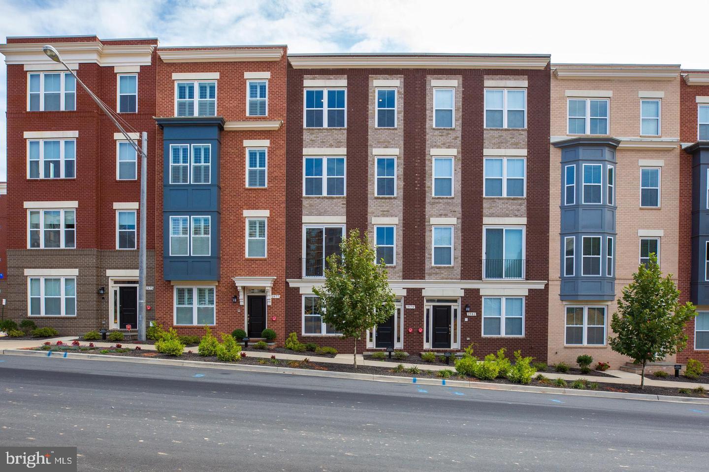 1979 Roland Clarke Place Reston, VA 20191 - Photo 2 of 52 a front view of a multi story building