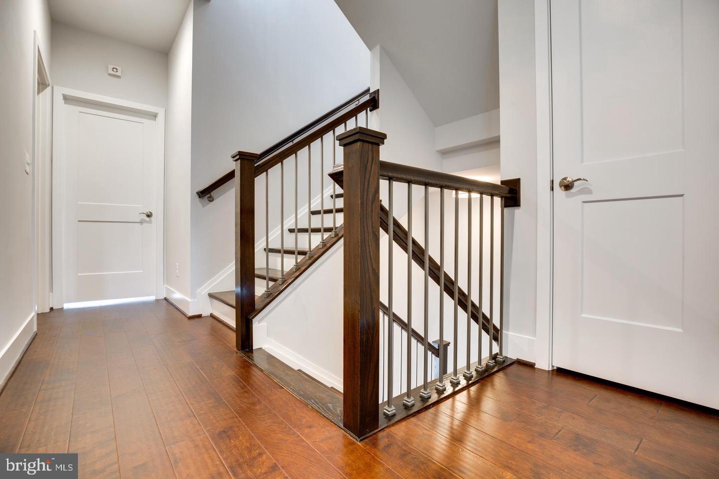 1979 Roland Clarke Place Reston, VA 20191 - Photo 22 of 52 a view of an entryway with wooden floor