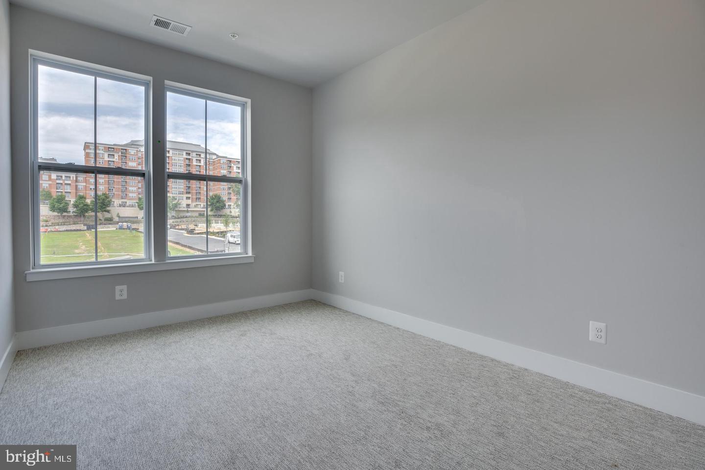 1979 Roland Clarke Place Reston, VA 20191 - Photo 29 of 52 an empty room with a window
