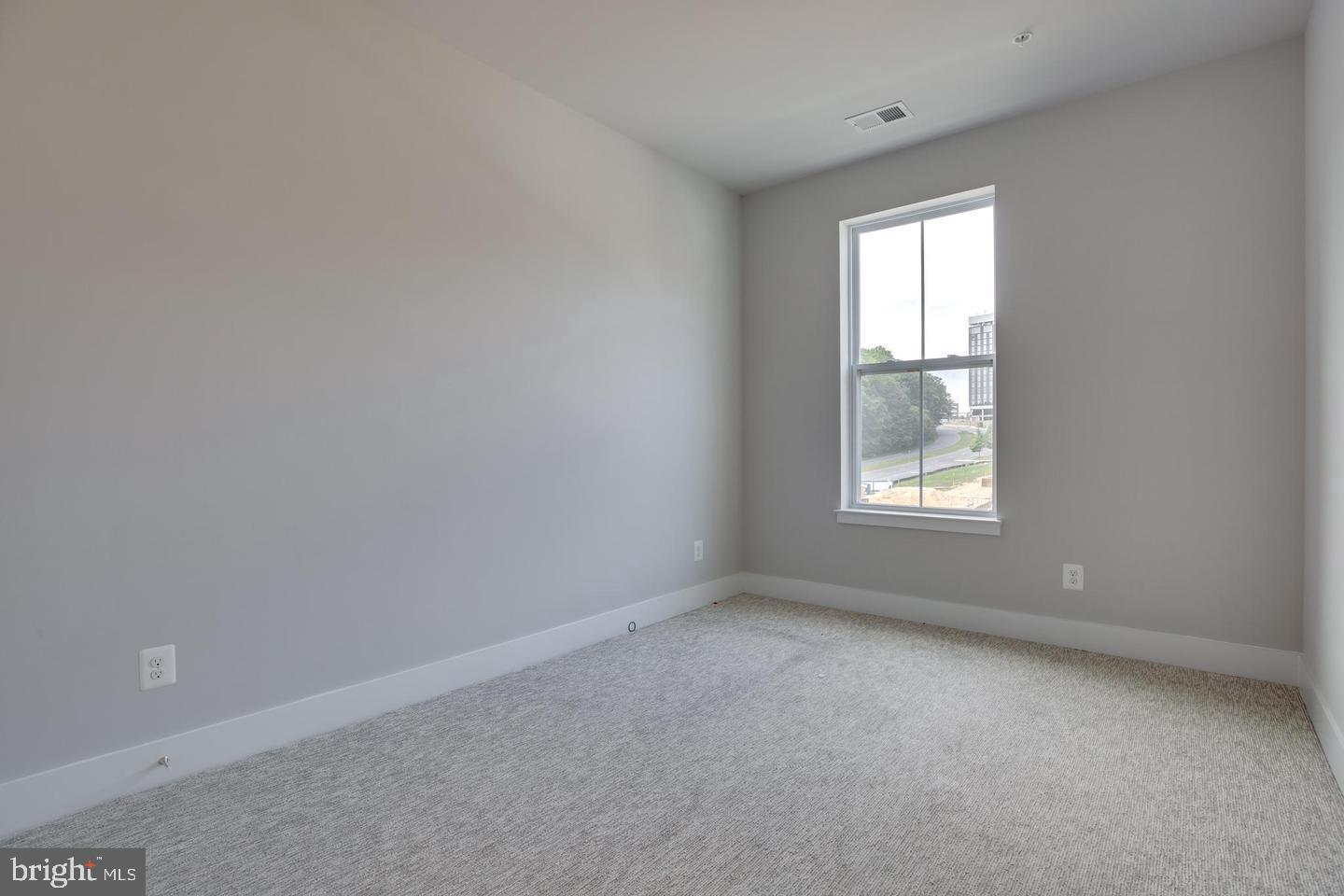 1979 Roland Clarke Place Reston, VA 20191 - Photo 31 of 52 an empty room with a window