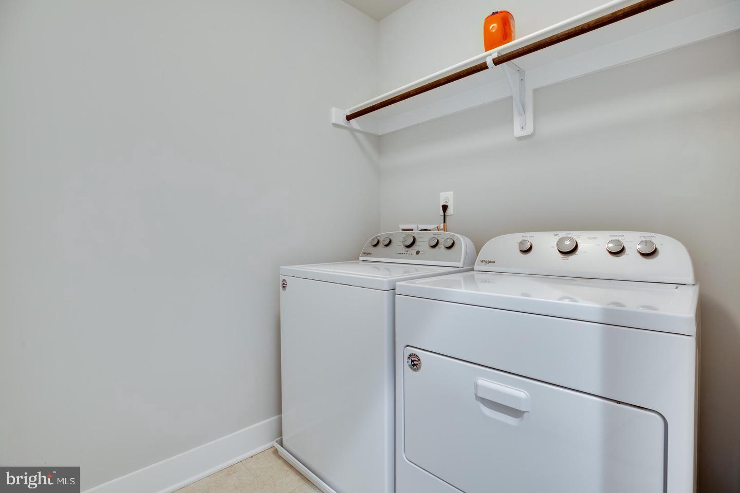 1979 Roland Clarke Place Reston, VA 20191 - Photo 34 of 52 a utility room with dryer and washer