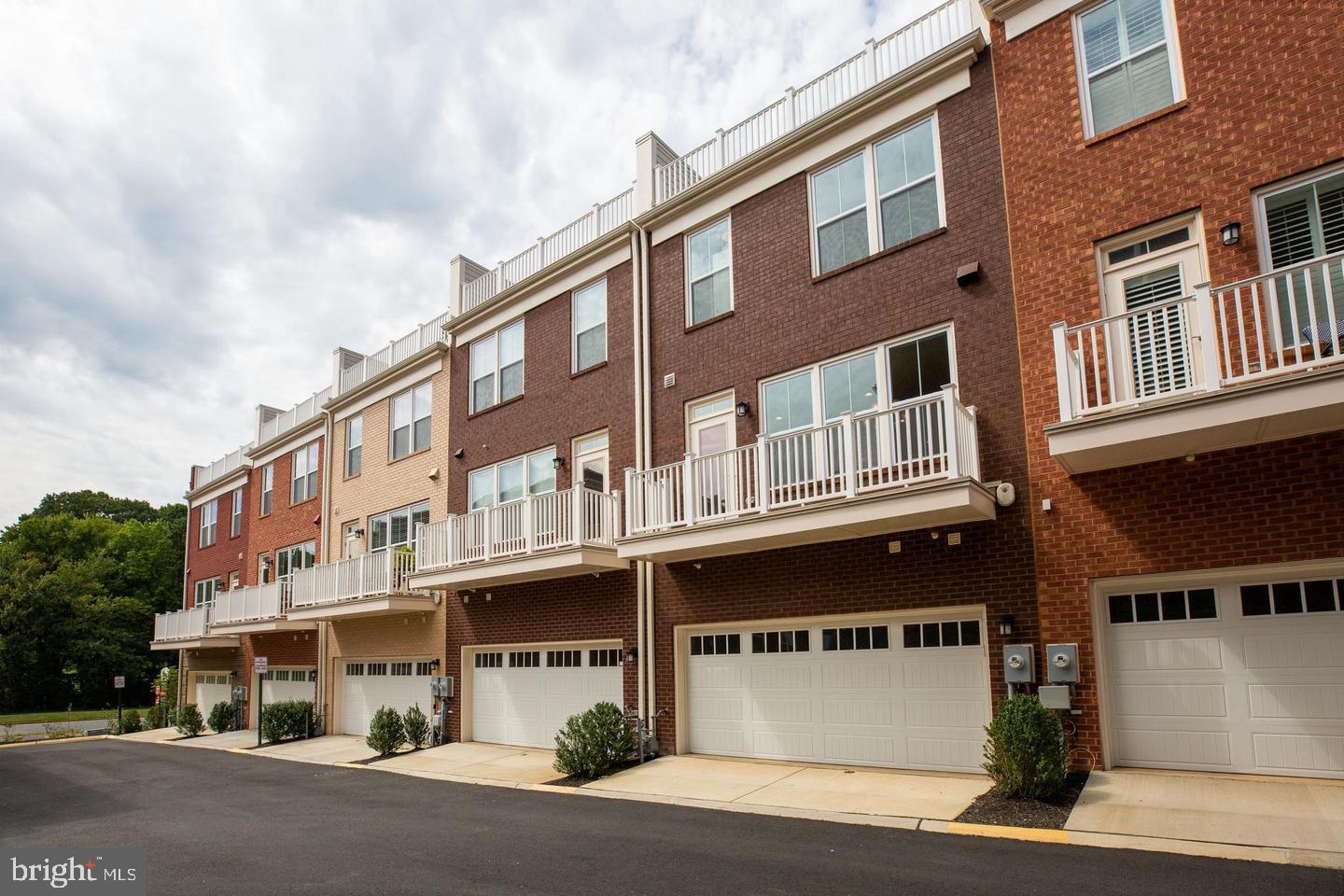 1979 Roland Clarke Place Reston, VA 20191 - Photo 52 of 52 a front view of a building with lot of windows