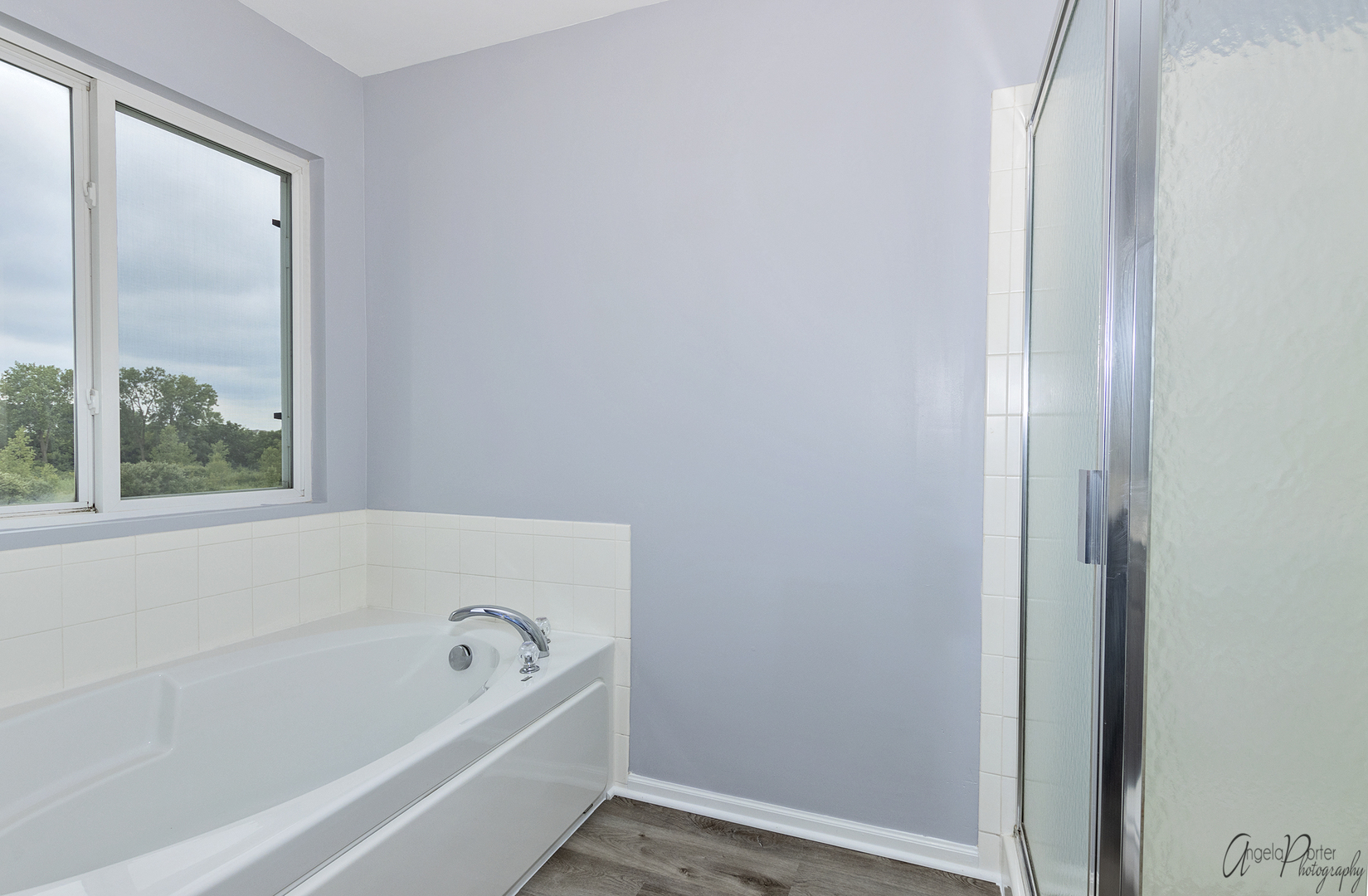 4801 Stillwater Road Wonder Lake, IL 60097 - Photo 20 of 36 a bathroom with a bathtub