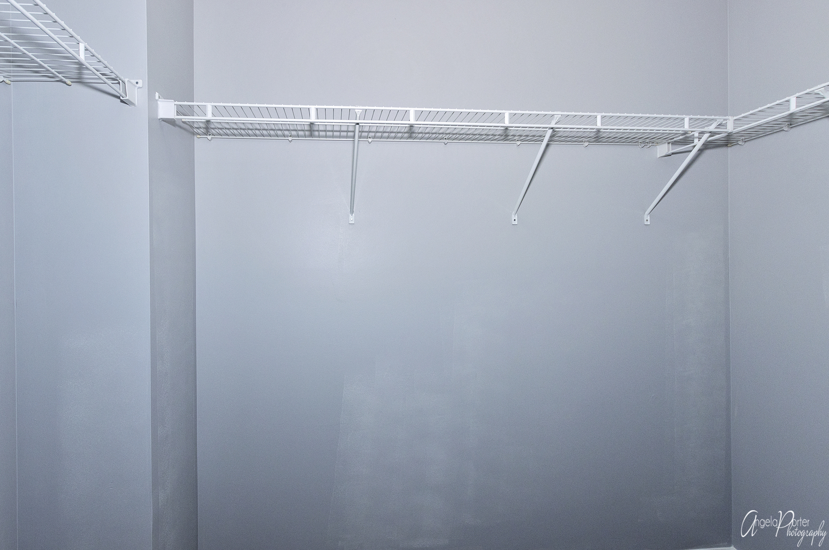 4801 Stillwater Road Wonder Lake, IL 60097 - Photo 22 of 36 a view of a room with racks on the wall