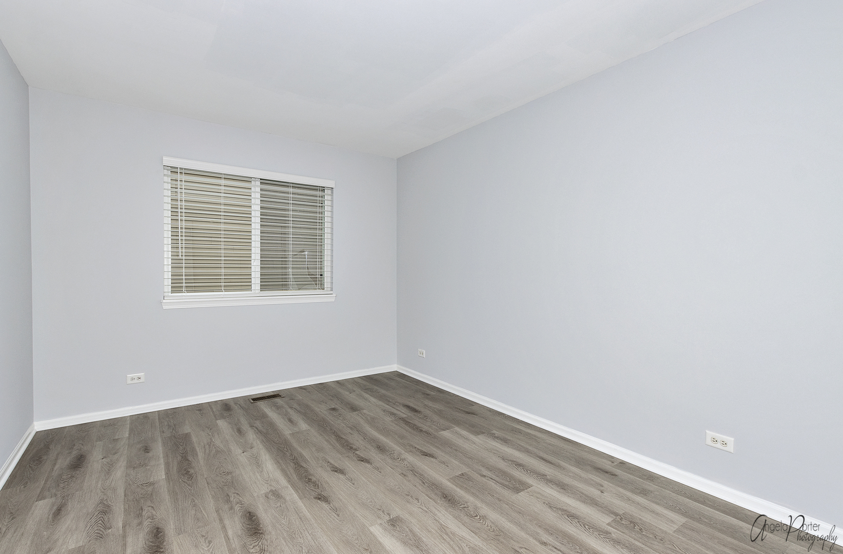 4801 Stillwater Road Wonder Lake, IL 60097 - Photo 25 of 36 an empty room with a window