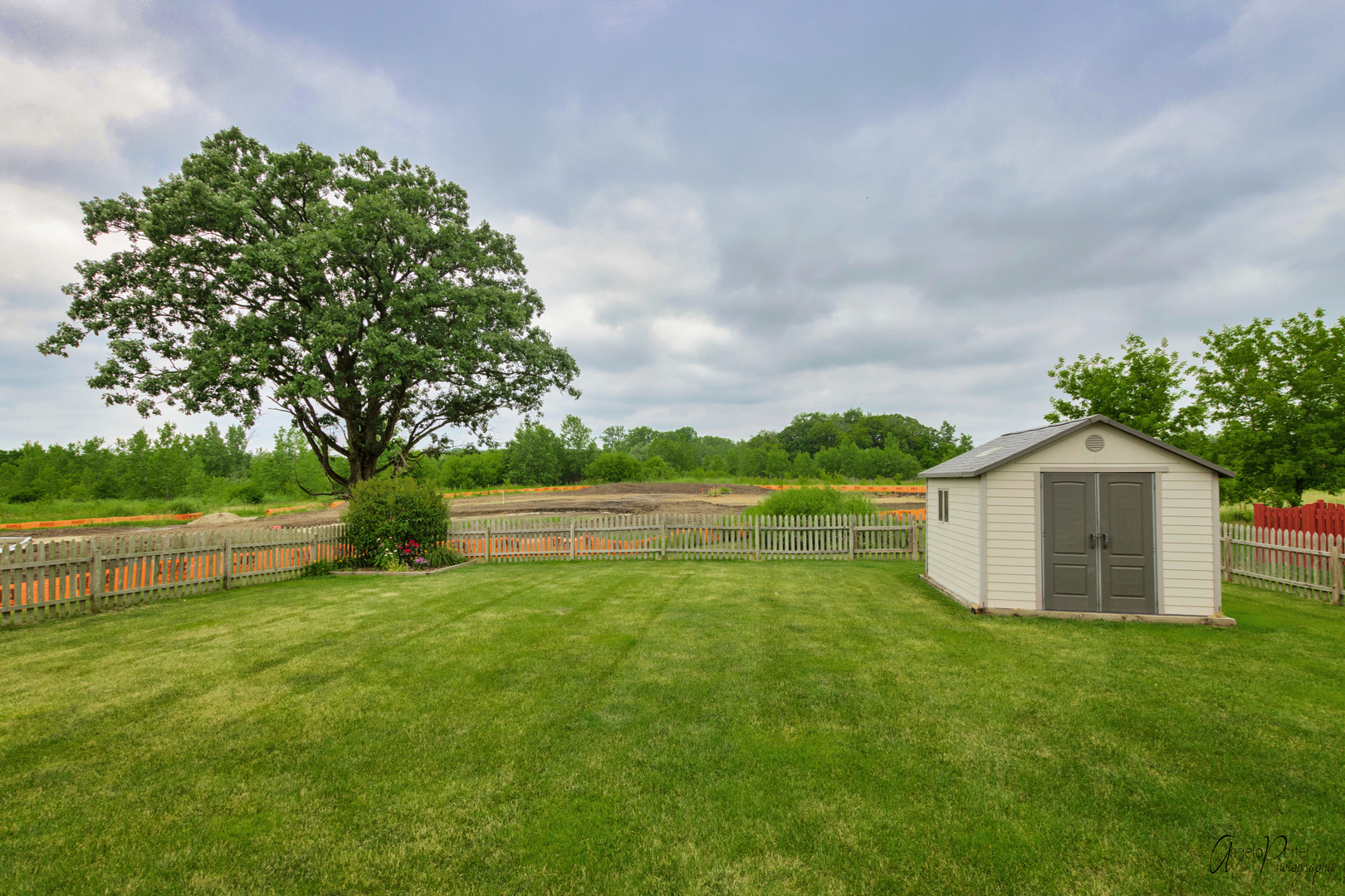 4801 Stillwater Road Wonder Lake, IL 60097 - Photo 34 of 36 a view of a house with a yard
