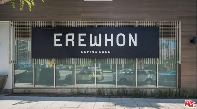 a view of a car park in front of a building