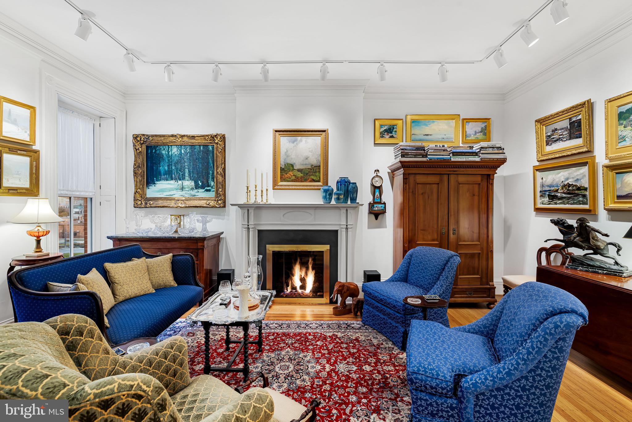 407 Warren Avenue Baltimore, MD 21230 - Photo 11 of 85 a living room with furniture and a fireplace
