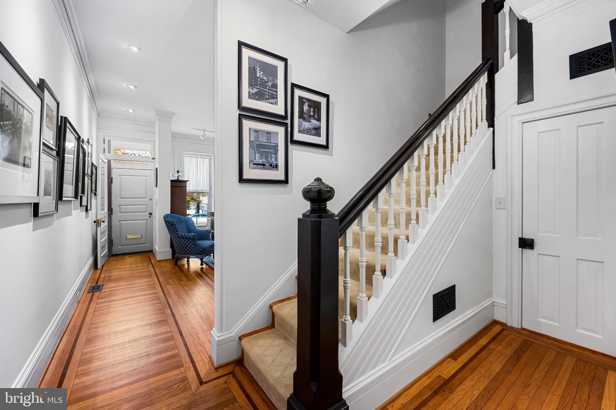 407 Warren Avenue Baltimore, MD 21230 - Photo 15 of 85 a view of a hallway with furniture and staircase