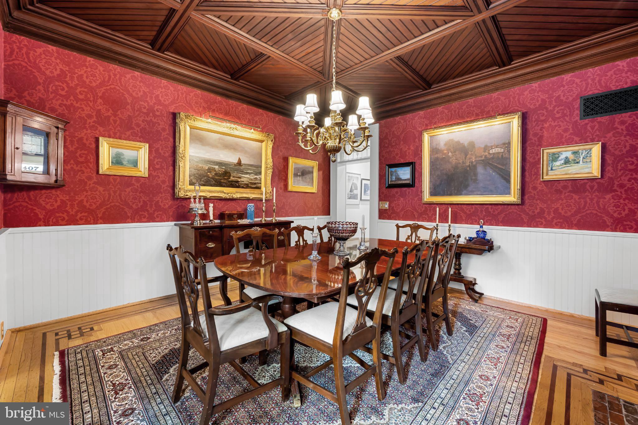 407 Warren Avenue Baltimore, MD 21230 - Photo 19 of 85 a view of a dining room with furniture and chandelier