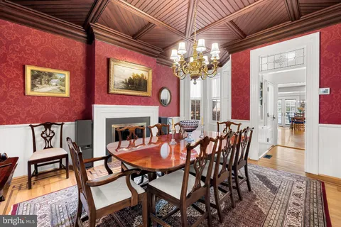 a front view of a house with outdoor seating