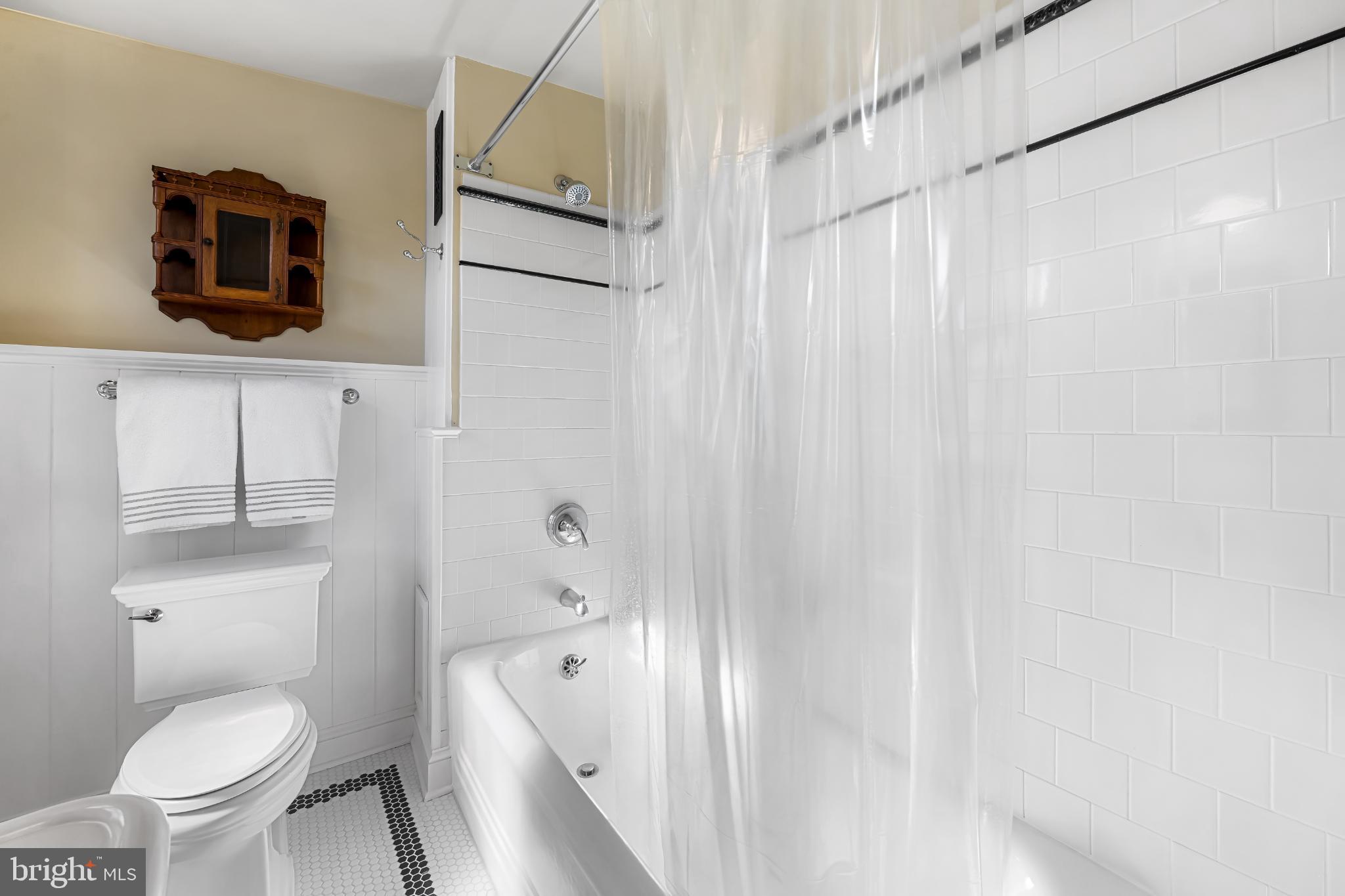 407 Warren Avenue Baltimore, MD 21230 - Photo 49 of 85 a bathroom with a toilet a sink and a bathtub