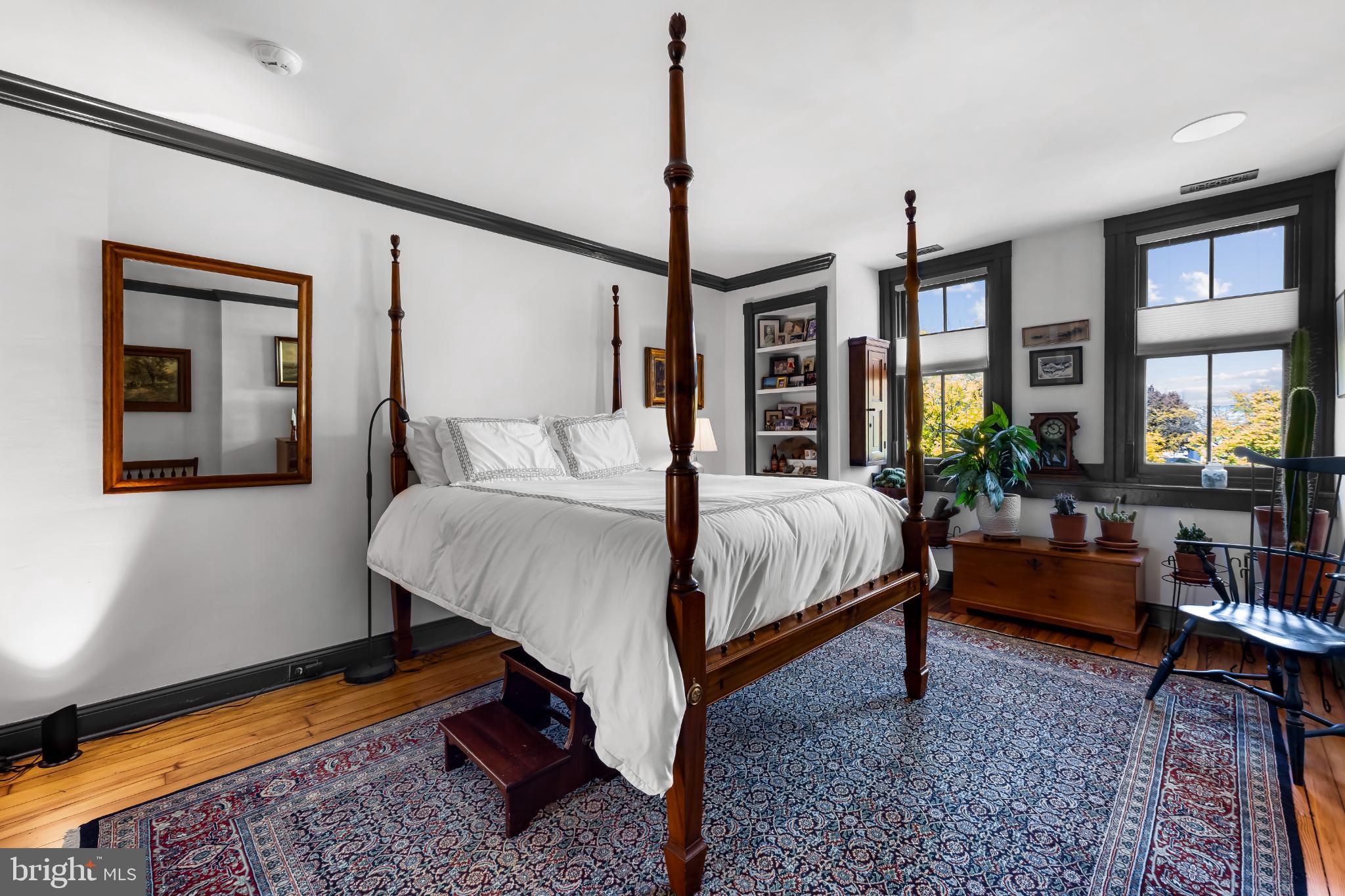 407 Warren Avenue Baltimore, MD 21230 - Photo 53 of 85 a bedroom with a bed lamps and couches