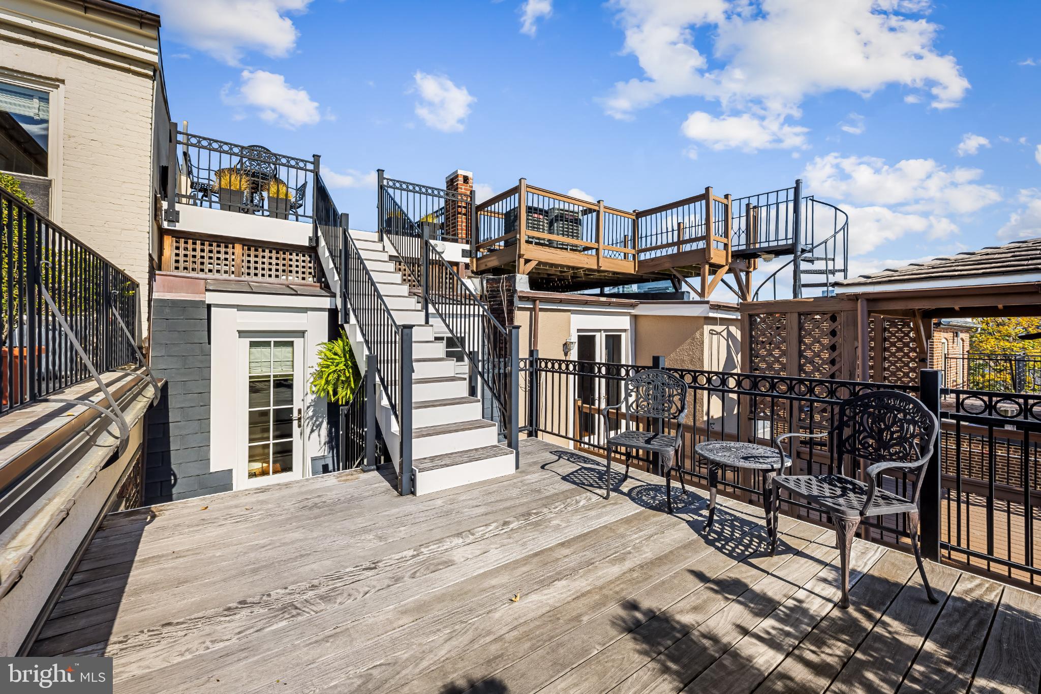 407 Warren Avenue Baltimore, MD 21230 - Photo 61 of 85 a view of a chairs and table in a balcony