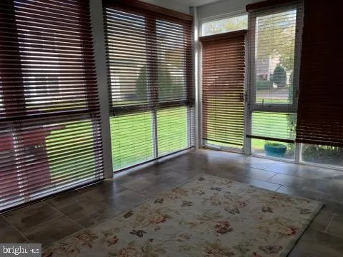 a view of a house with a yard and garage