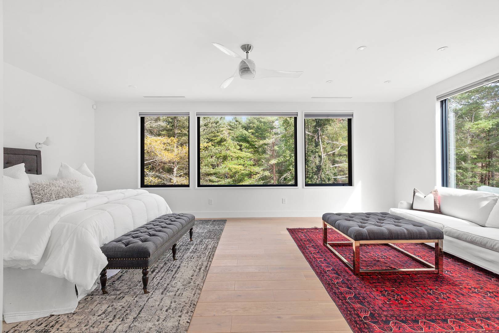 101 2 Holes Water Road East Hampton, NY 11937 - Photo 13 of 27 a living room with furniture and a large window