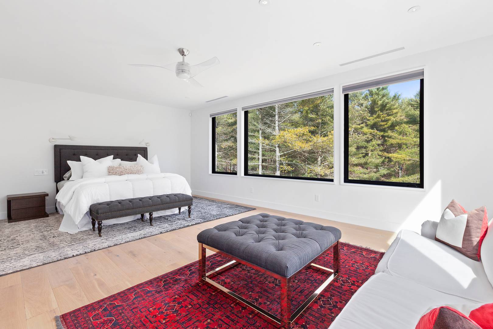 101 2 Holes Water Road East Hampton, NY 11937 - Photo 14 of 27 a bedroom with furniture and a large window