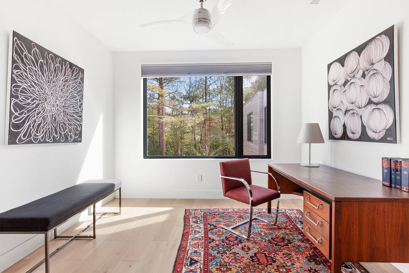 101 2 Holes Water Road East Hampton, NY 11937 - Photo 15 of 27 a view of a workspace with furniture and a window