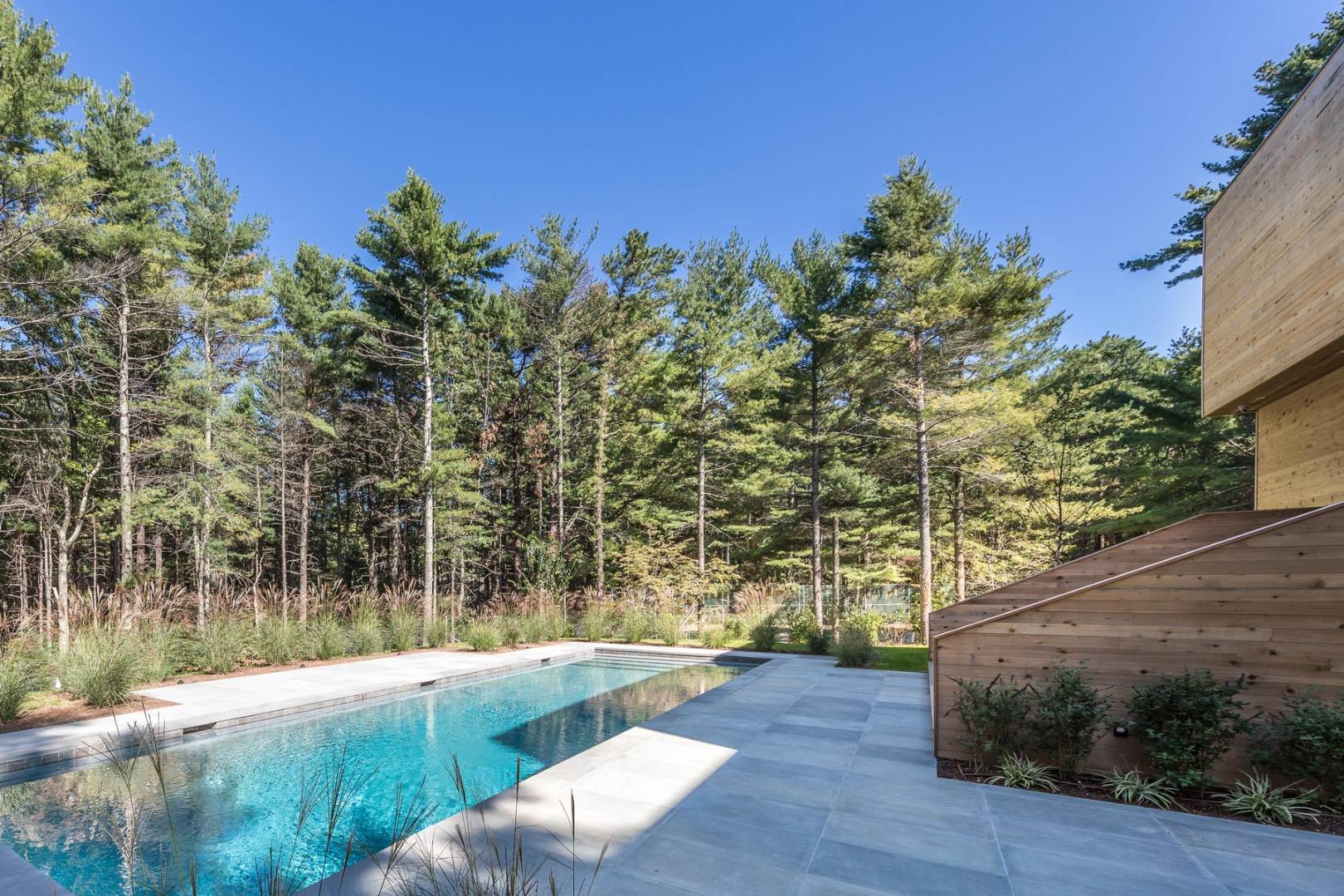 101 2 Holes Water Road East Hampton, NY 11937 - Photo 24 of 27 a view of a backyard of the house