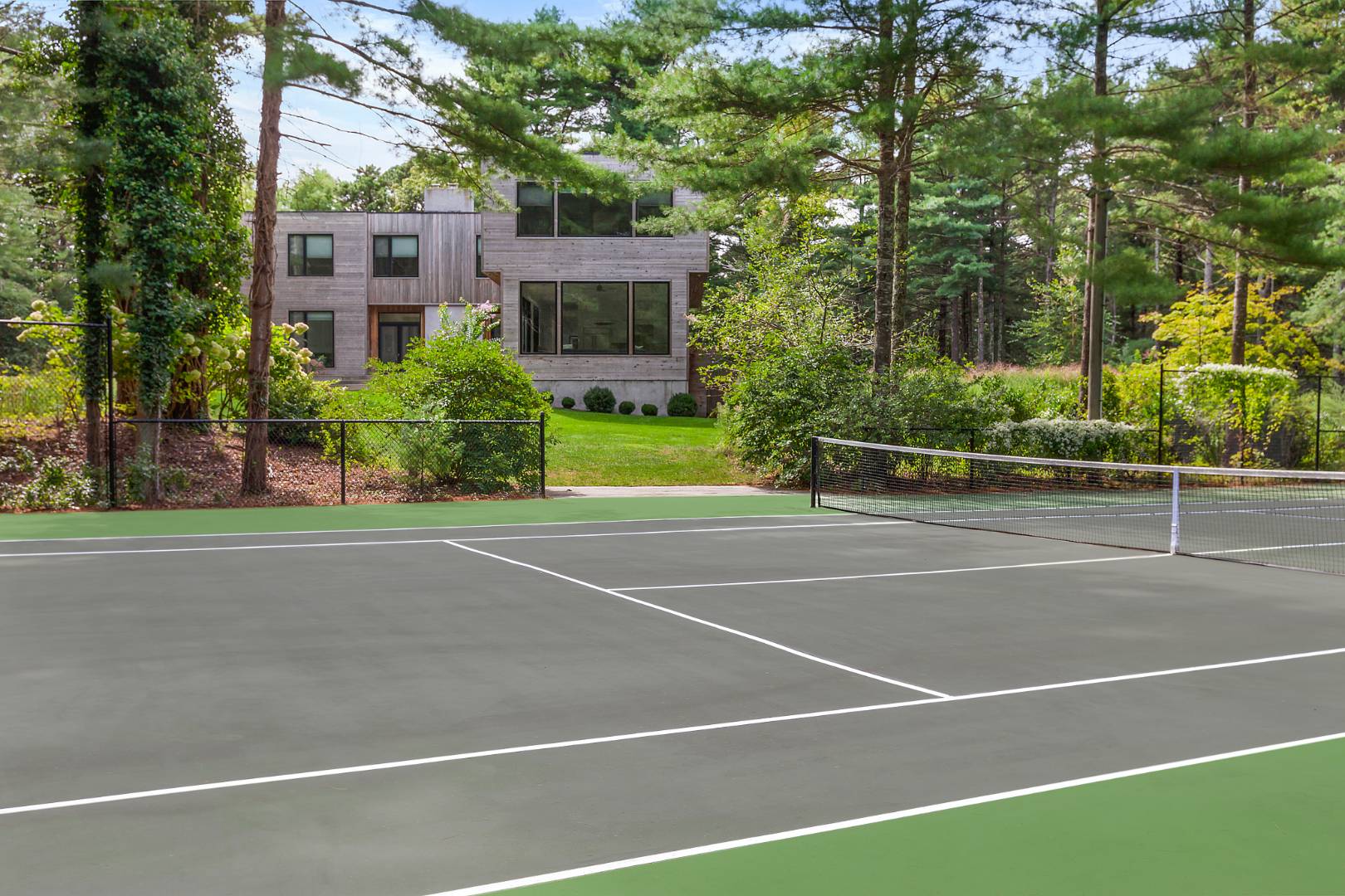 101 2 Holes Water Road East Hampton, NY 11937 - Photo 26 of 27 a view of a tennis court