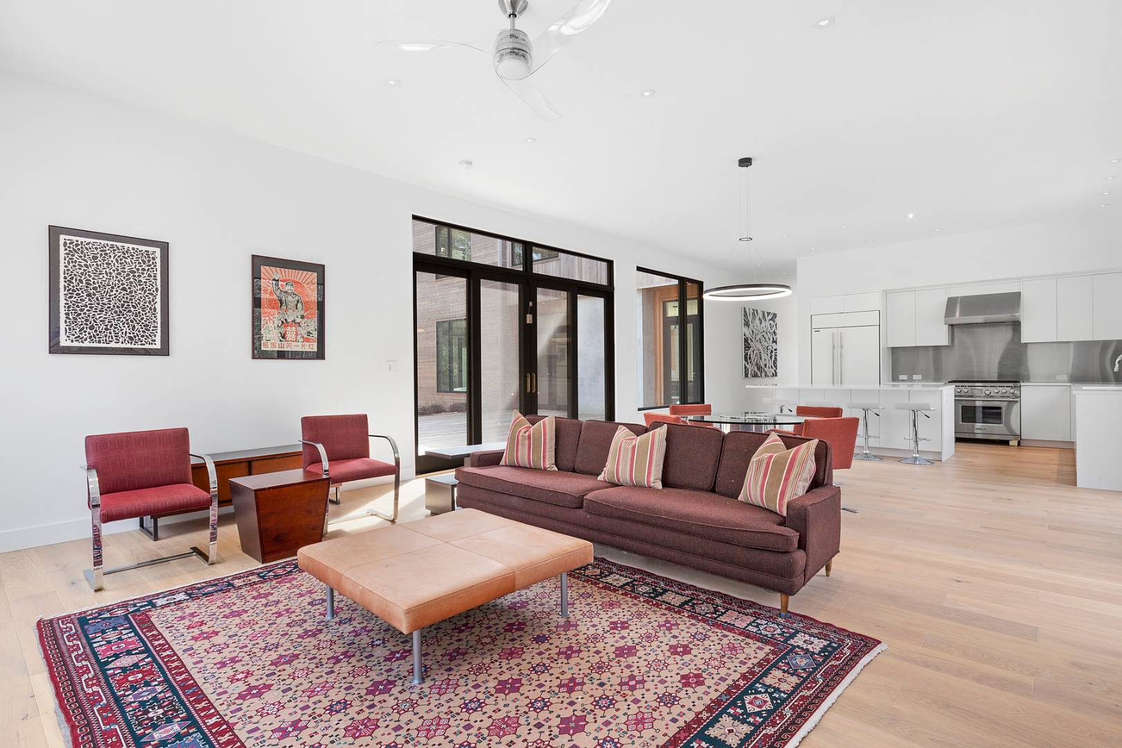 101 2 Holes Water Road East Hampton, NY 11937 - Photo 10 of 27 a living room with furniture and a rug