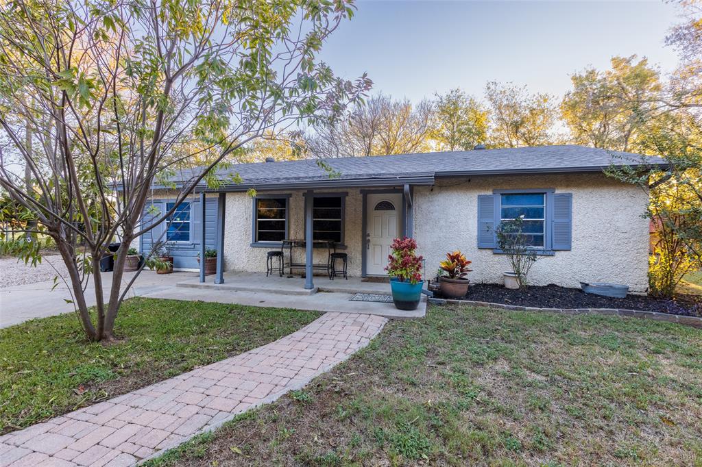 2401 West Bethesda Road Burleson, TX 76028 - Photo 3 of 12 a view of a house with backyard and sitting area