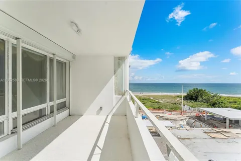 a balcony with hardwood