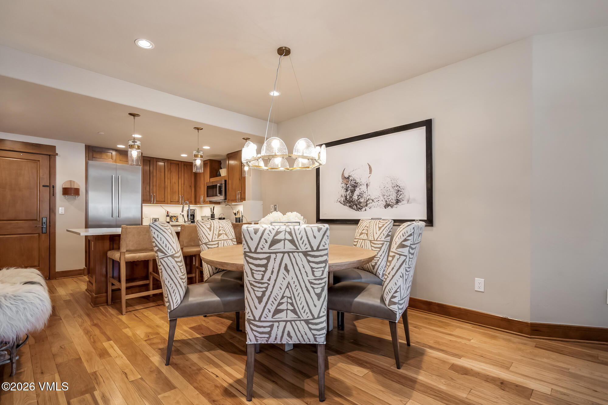 1087 Bachelor Ridge Road, Unit 205 Avon, CO 81620 - Photo 11 of 46 a view of a dining room with furniture