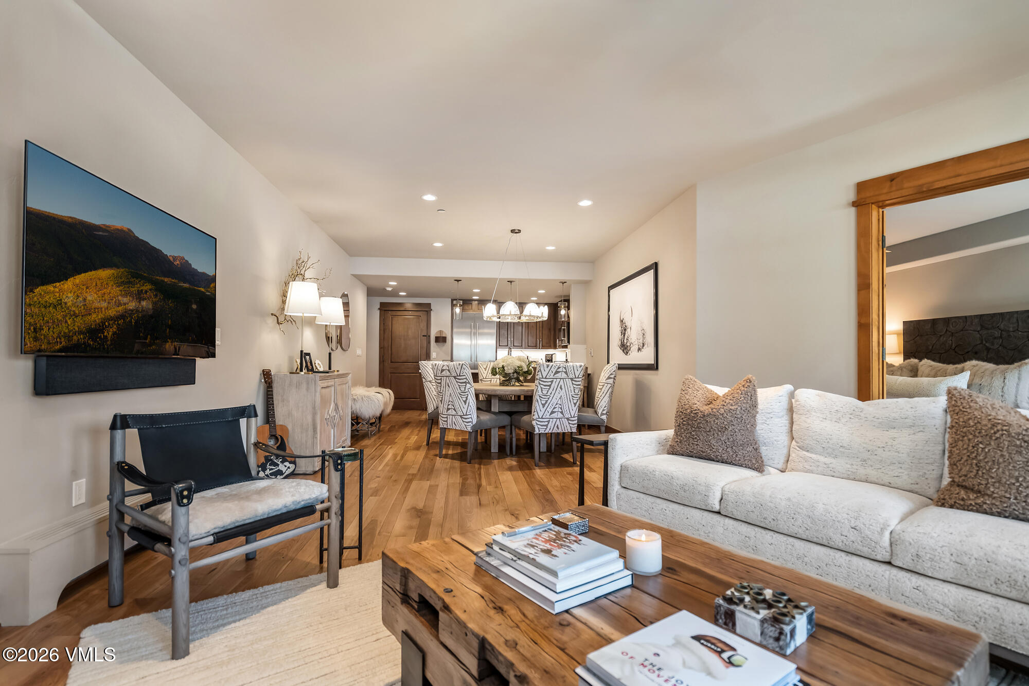 1087 Bachelor Ridge Road, Unit 205 Avon, CO 81620 - Photo 13 of 46 a living room with furniture and a flat screen tv