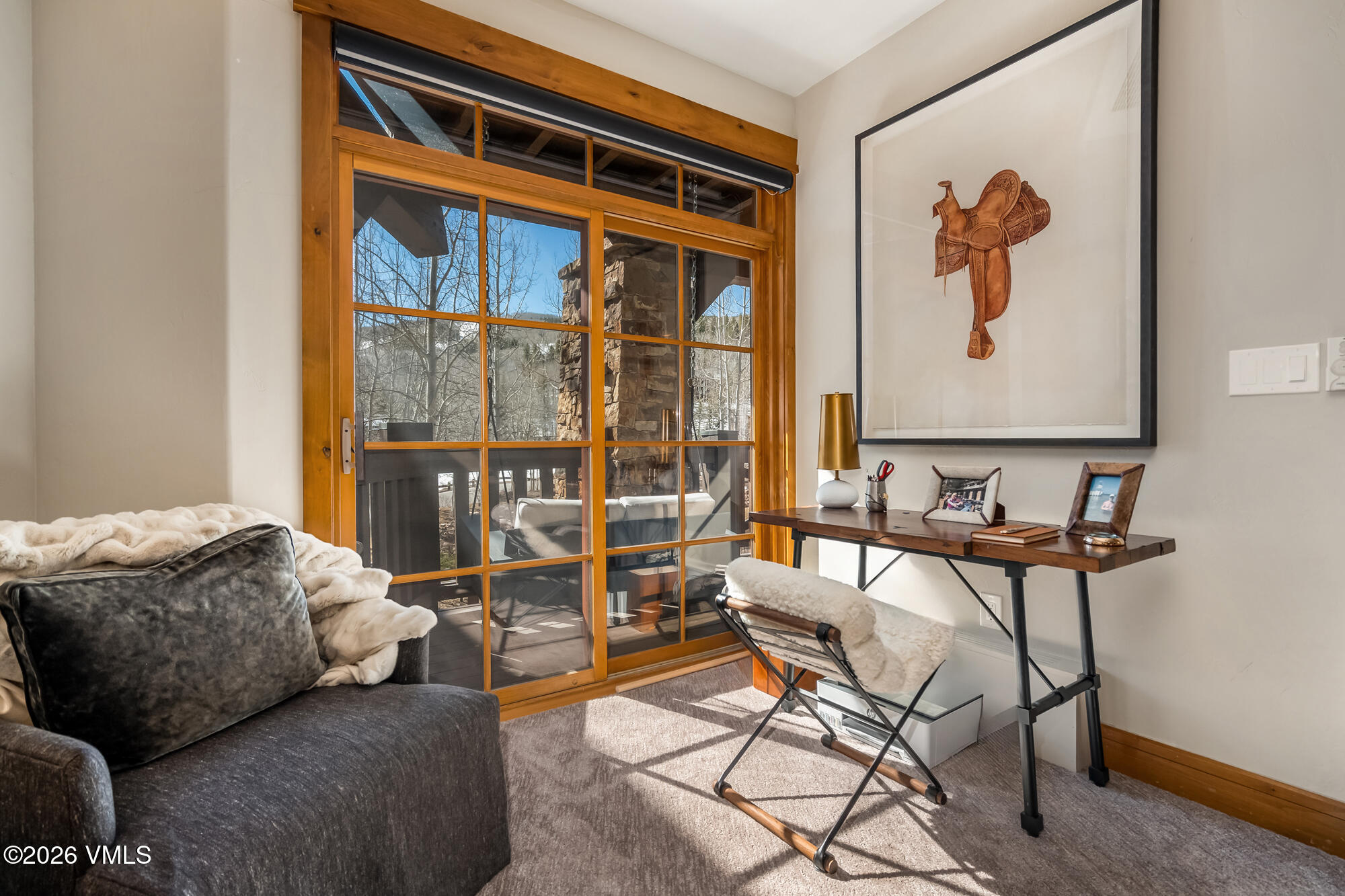 1087 Bachelor Ridge Road, Unit 205 Avon, CO 81620 - Photo 16 of 46 a bedroom with furniture and a window