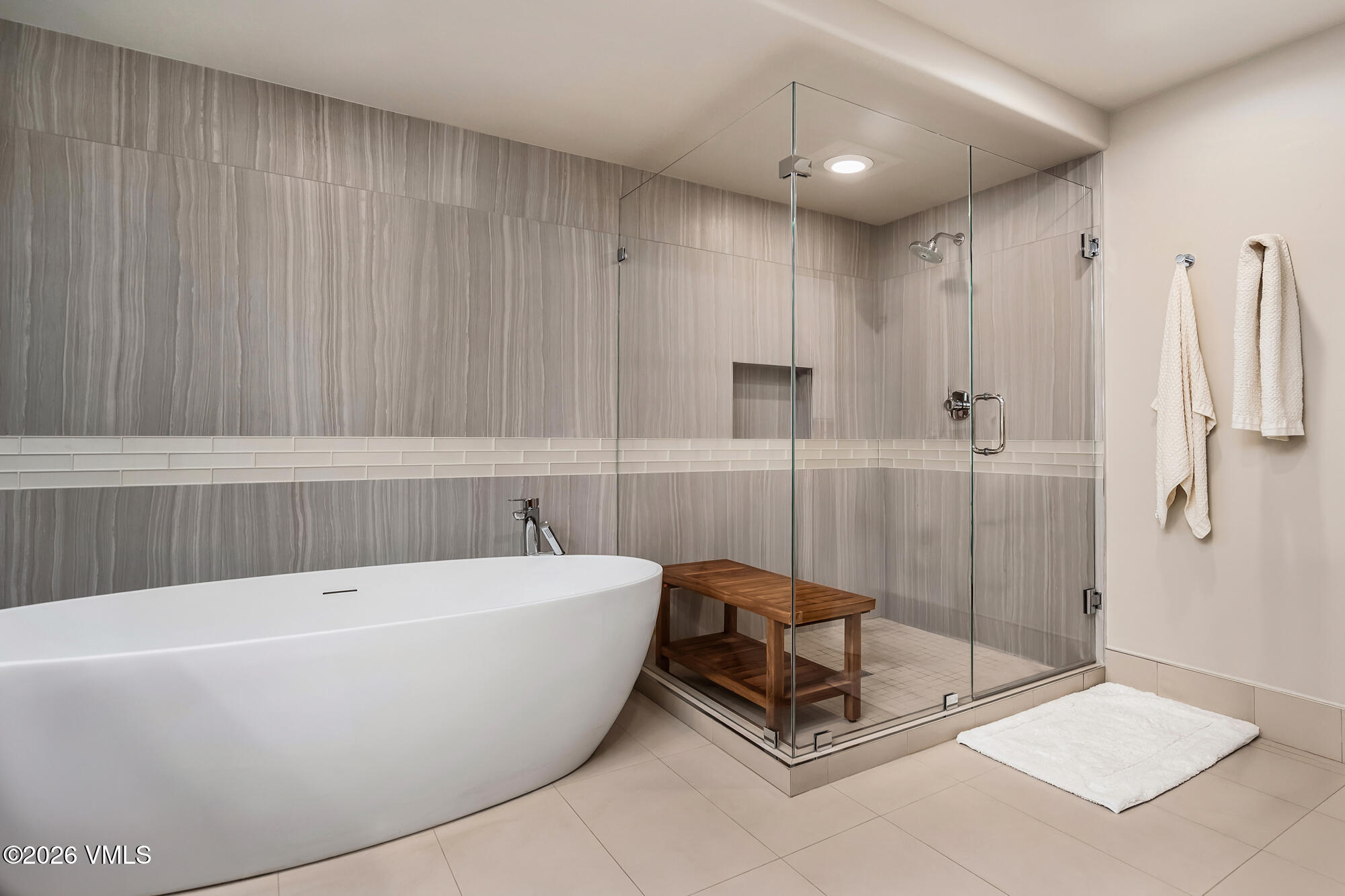 1087 Bachelor Ridge Road, Unit 205 Avon, CO 81620 - Photo 18 of 46 a bathroom with a bathtub and shower