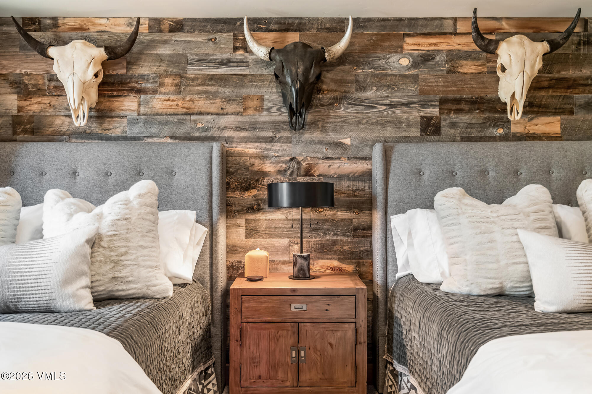 1087 Bachelor Ridge Road, Unit 205 Avon, CO 81620 - Photo 23 of 46 a living room with furniture and a fireplace