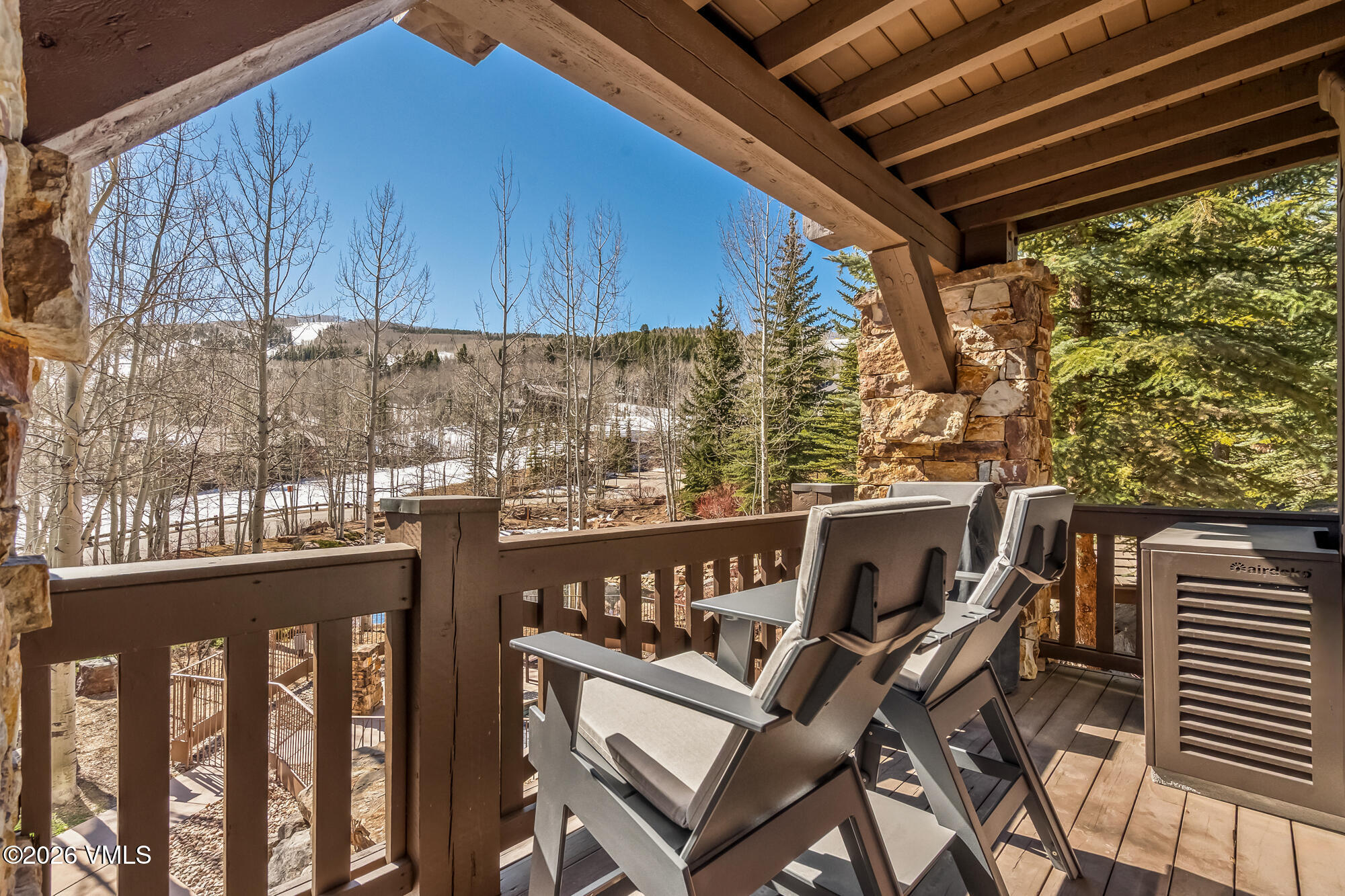 1087 Bachelor Ridge Road, Unit 205 Avon, CO 81620 - Photo 31 of 46 a view of a balcony with an outdoor space