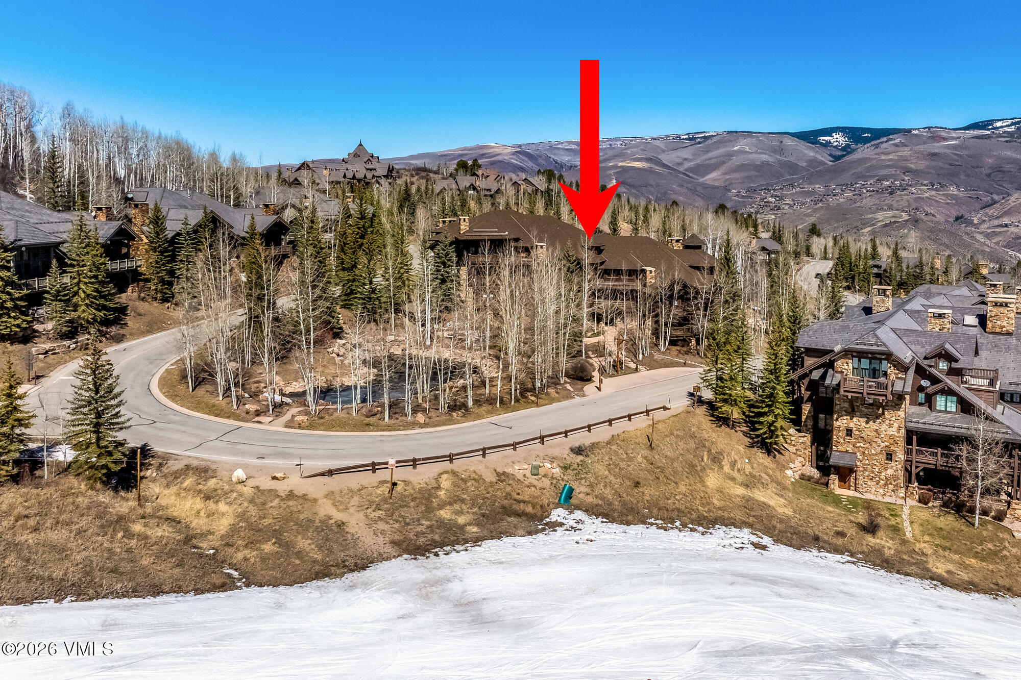 1087 Bachelor Ridge Road, Unit 205 Avon, CO 81620 - Photo 39 of 46 a front view of a house with a yard