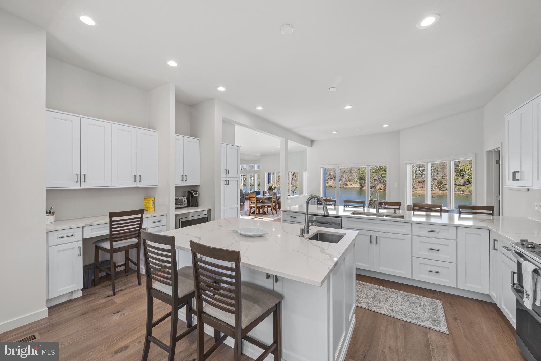 378 Forest Beach Road Annapolis, MD 21409 - Photo 16 of 42 a kitchen with appliances a sink and cabinets