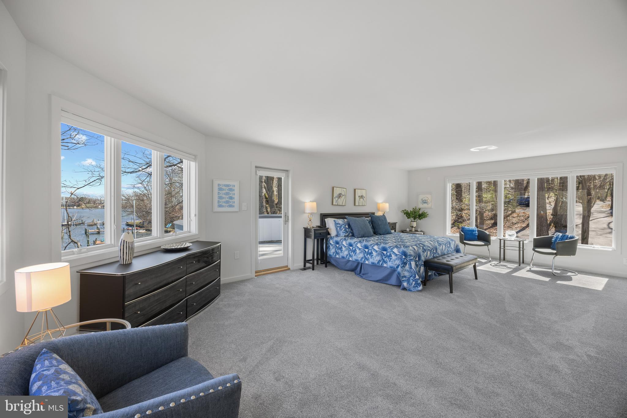 378 Forest Beach Road Annapolis, MD 21409 - Photo 23 of 42 a living room with furniture and large windows