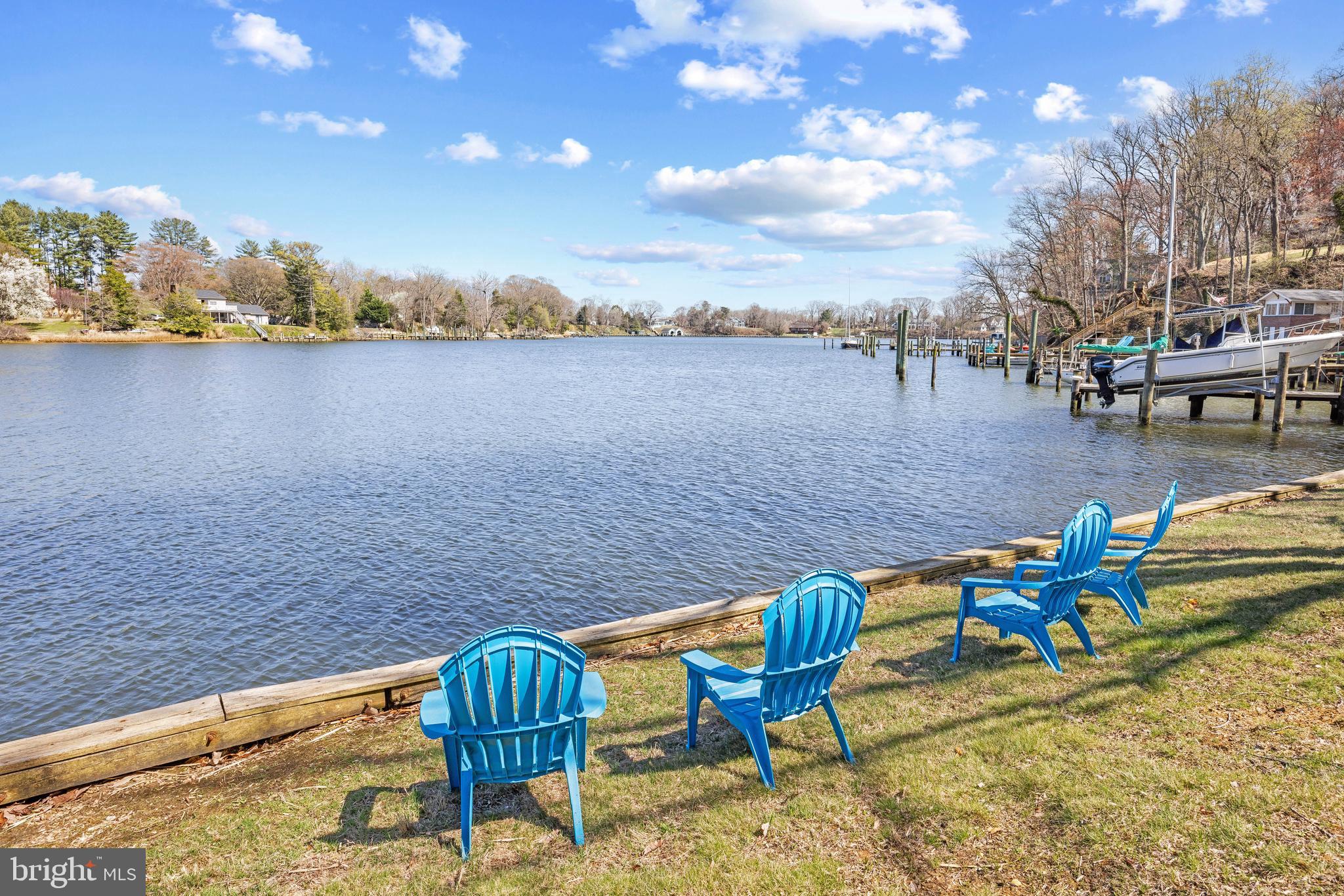 378 Forest Beach Road Annapolis, MD 21409 - Photo 35 of 42 a view of a lake with chairs