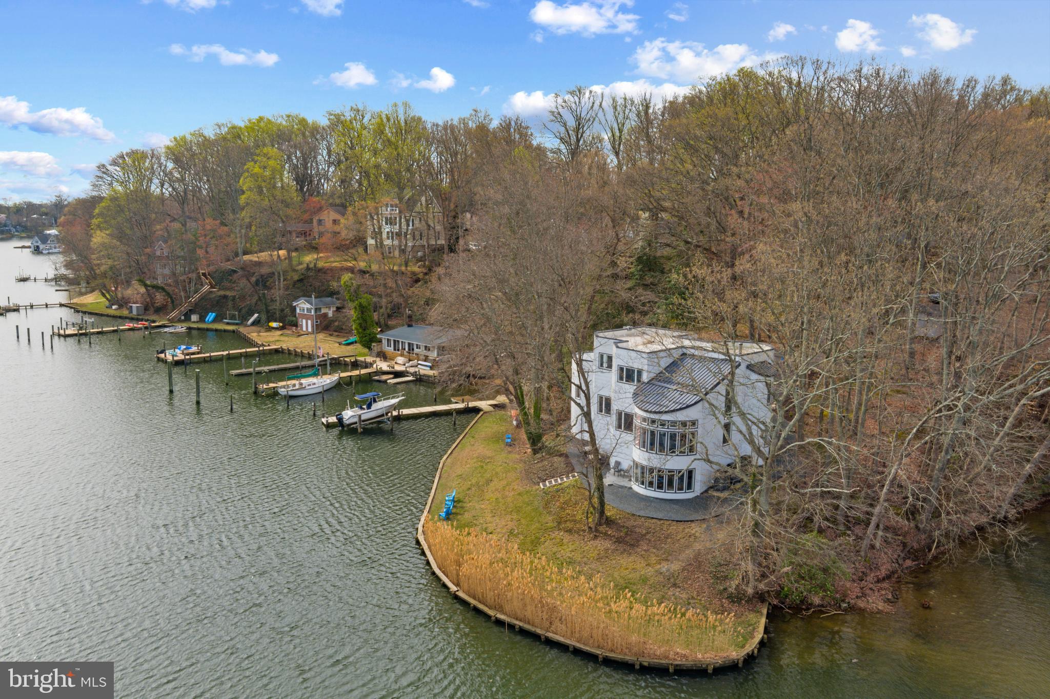 378 Forest Beach Road Annapolis, MD 21409 - Photo 36 of 42 a view of a lake in middle of the house
