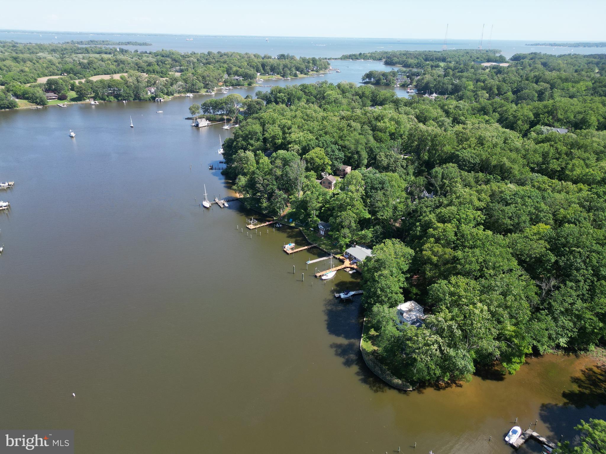 378 Forest Beach Road Annapolis, MD 21409 - Photo 38 of 42 an aerial view of a house with a yard and lake view