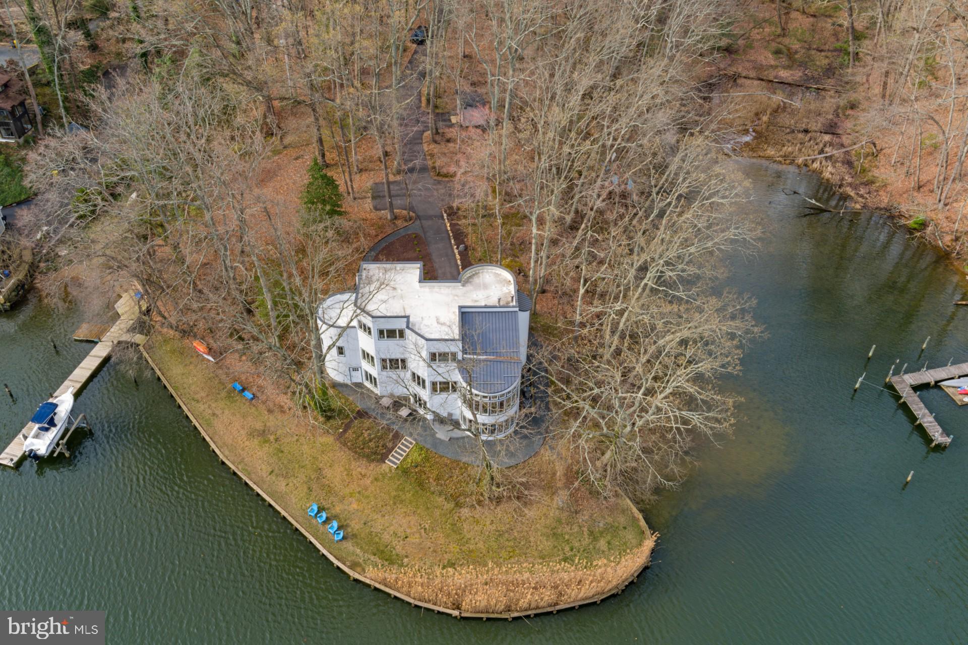 378 Forest Beach Road Annapolis, MD 21409 - Photo 4 of 42 a view of a balcony with a bench
