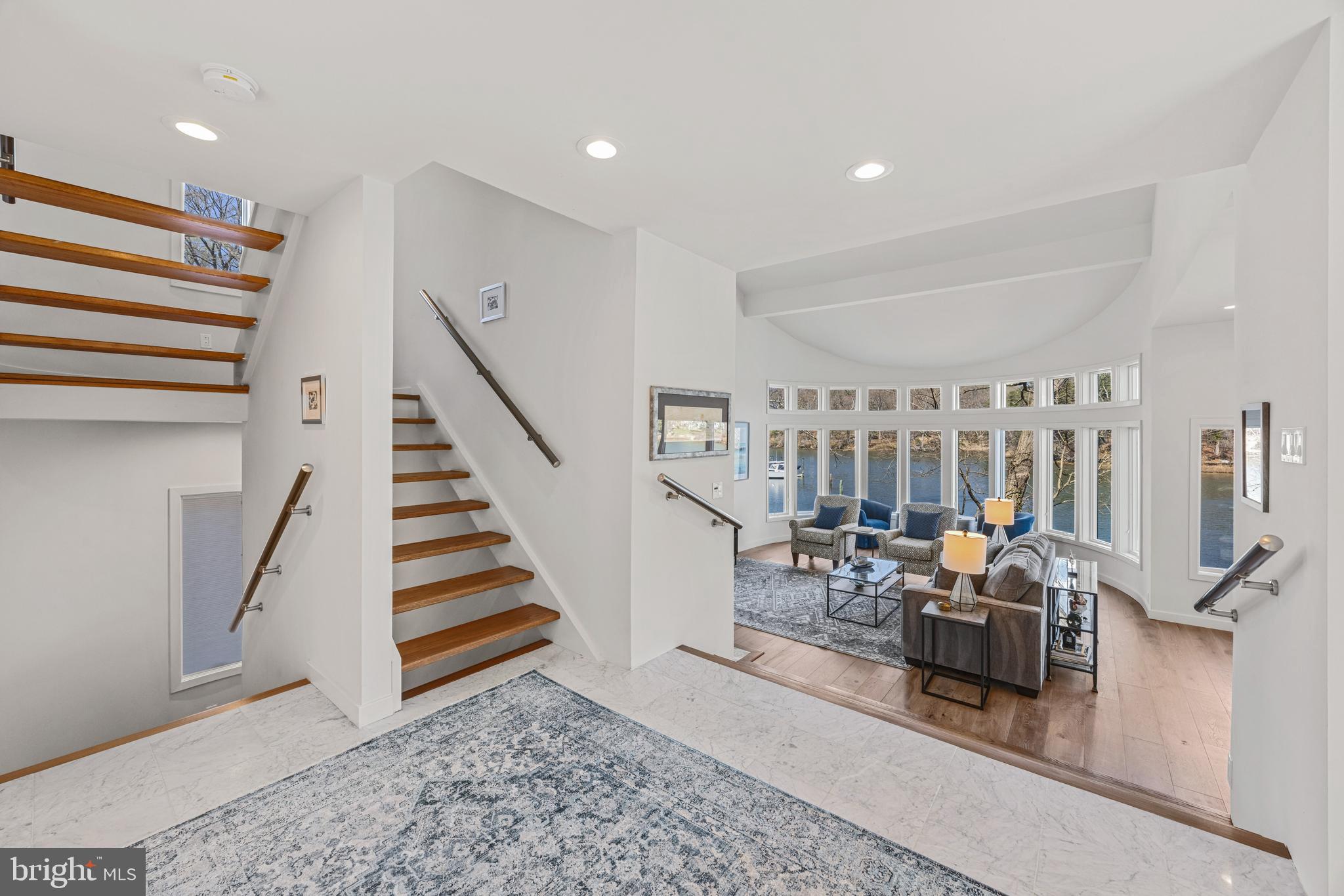 378 Forest Beach Road Annapolis, MD 21409 - Photo 6 of 42 a living room with furniture and wooden floor
