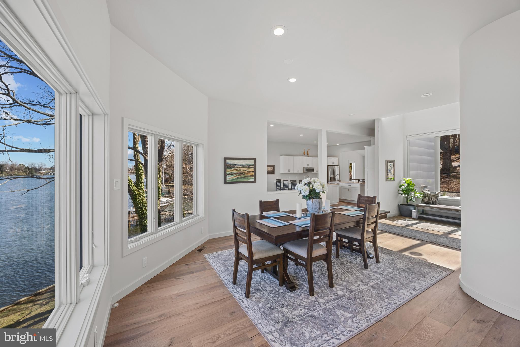 378 Forest Beach Road Annapolis, MD 21409 - Photo 10 of 42 a dining room with furniture and wooden floor