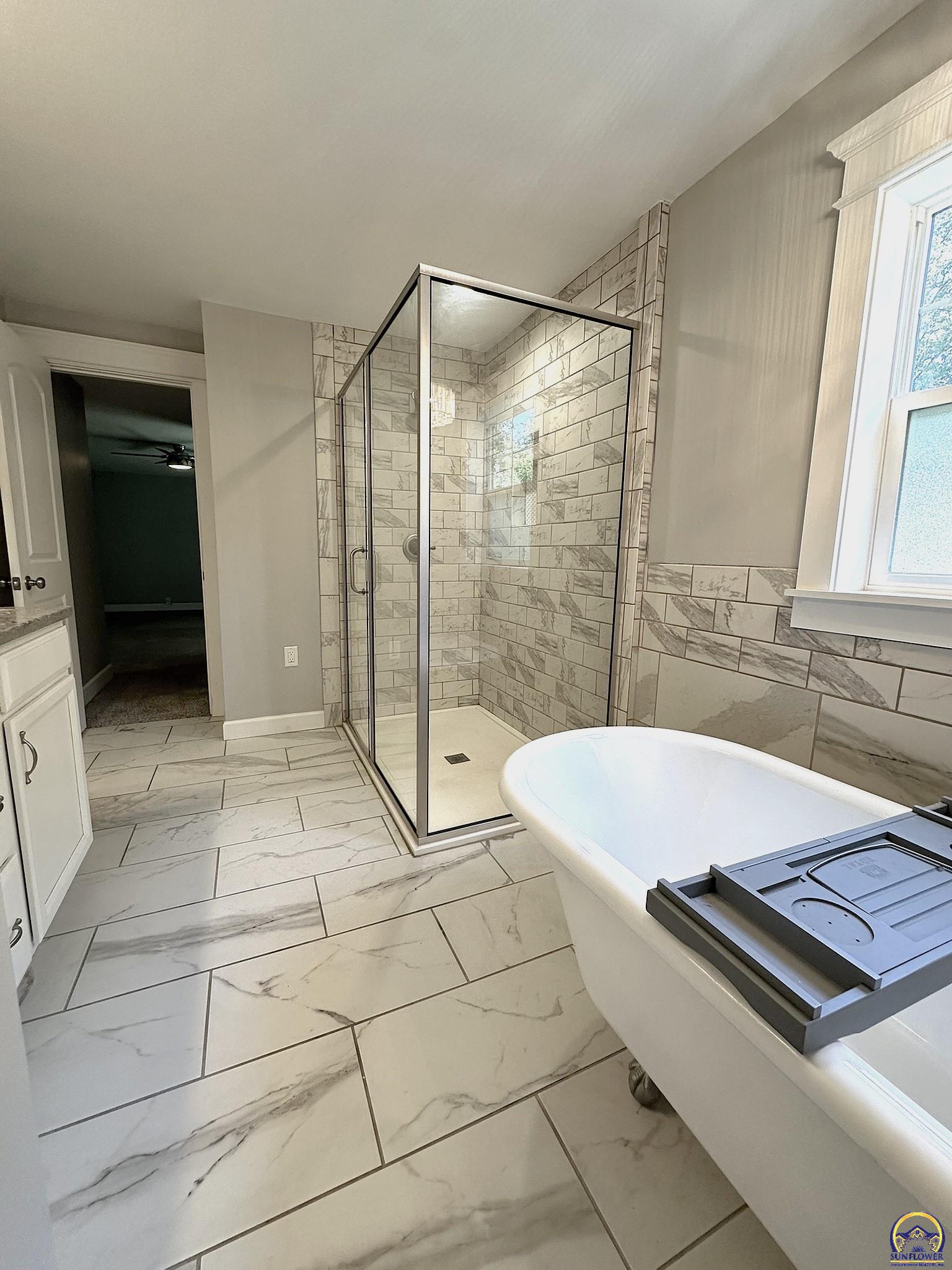 1520 Southwest Oakley Avenue Topeka, KS 66604 - Photo 44 of 76 En Suite