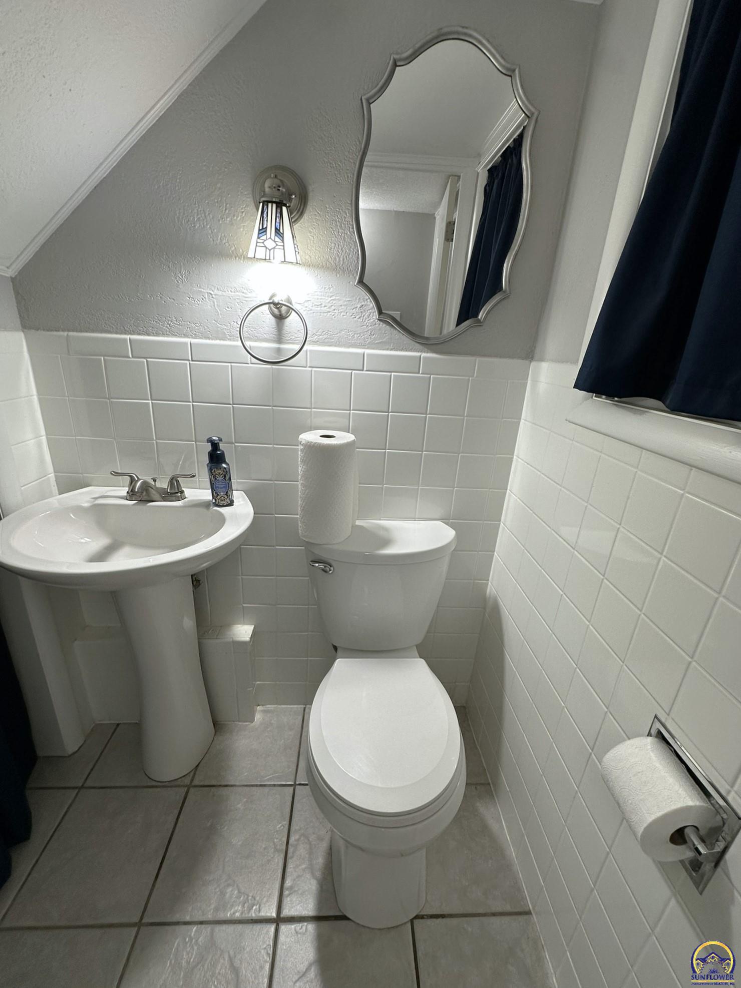 1520 Southwest Oakley Avenue Topeka, KS 66604 - Photo 69 of 76 Main Floor Half Bath