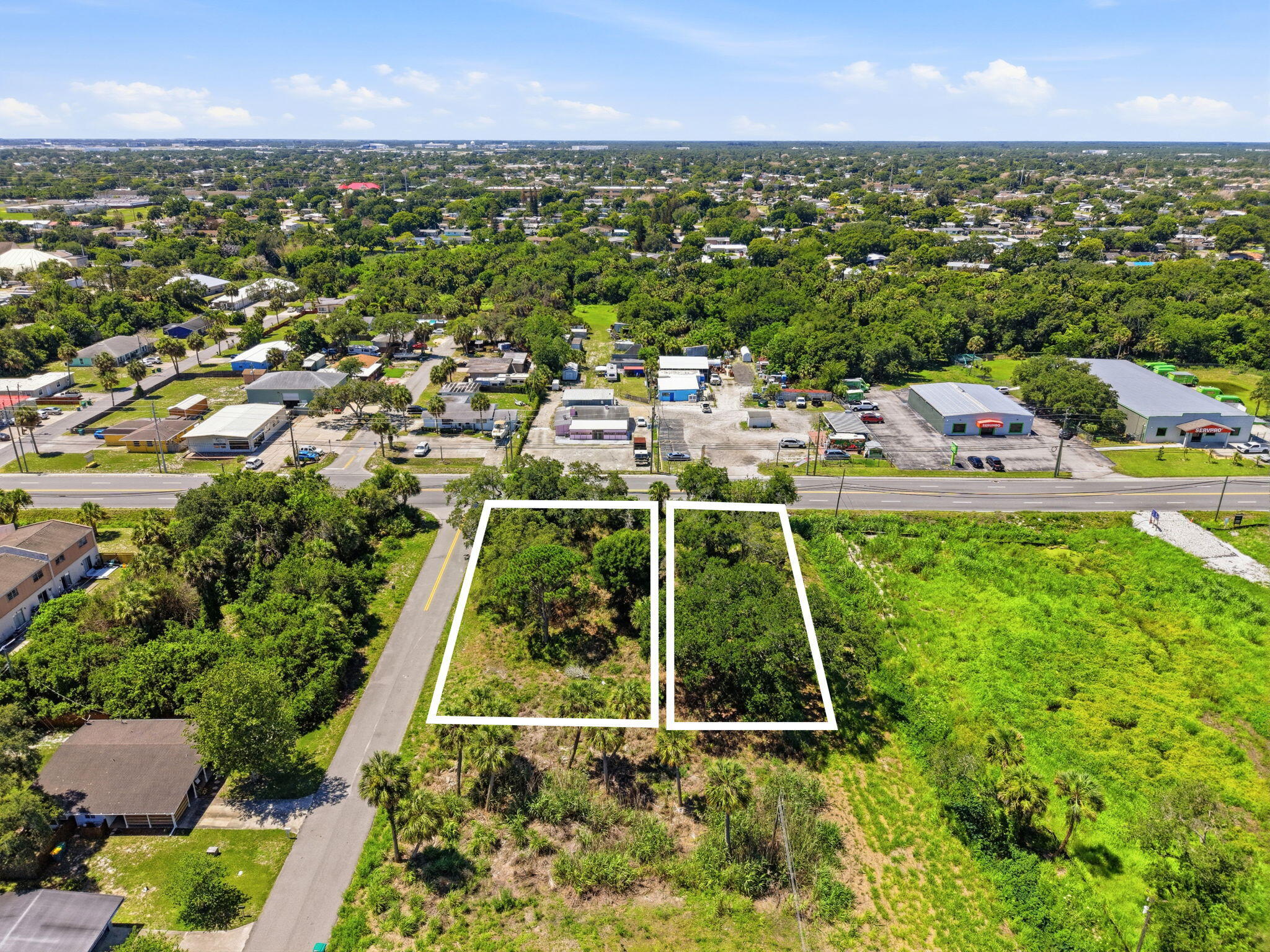 0 Aurora Road Melbourne, FL 32935 - Photo 7 of 20 an aerial view of residential houses with outdoor space